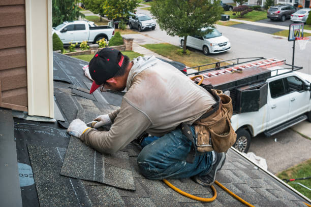 Professional Roof Replacement technician working in Newton Lower Falls, MA